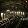 Looking down a Paris subway tunnel.